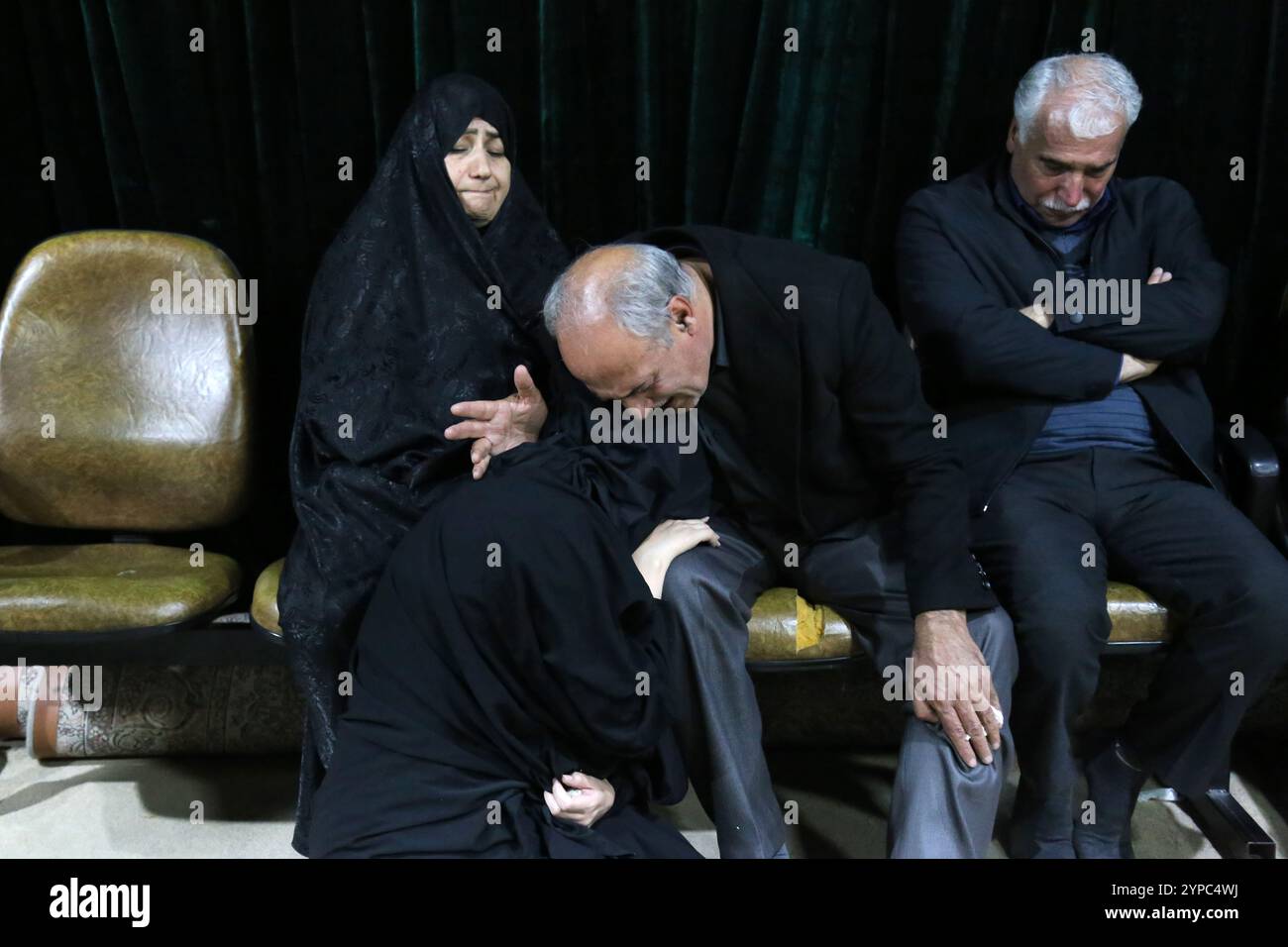 Tehran, Iran. 29th Nov, 2024. Family and relevance mourn during the funeral ceremony of Brigadier General Kiyomarth Porhashmi, a senior officer of the Islamic Revolutionary Guard Corps (IRGC) Quds Force, who was killed in Aleppo, Syria. The IRGC Quds Force is a unit of Iran's Revolutionary Guard that conducts military, intelligence, and support operations abroad to advance Iran's regional influence. (Credit Image: © Rouzbeh Fouladi/ZUMA Press Wire) EDITORIAL USAGE ONLY! Not for Commercial USAGE! Stock Photo