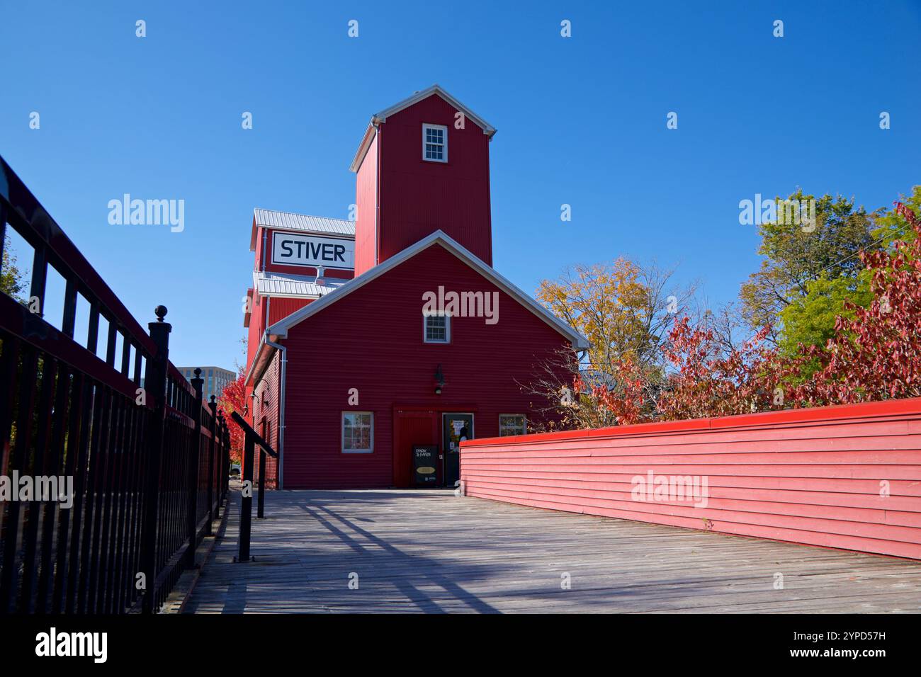 Building exterior of an the railway station with red grain silo Stock Photo