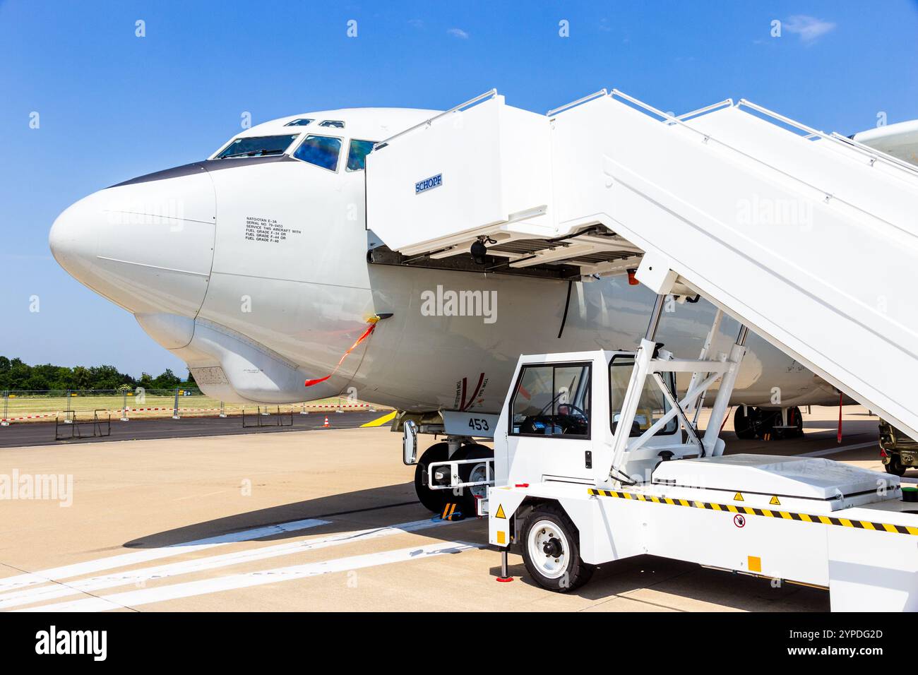 NATO Boeing E-3 Sentry AWACS radar plane and stairs on the runway of Norvenich Airbase. Norvenich, Germany - Jun 12, 2015 Stock Photo