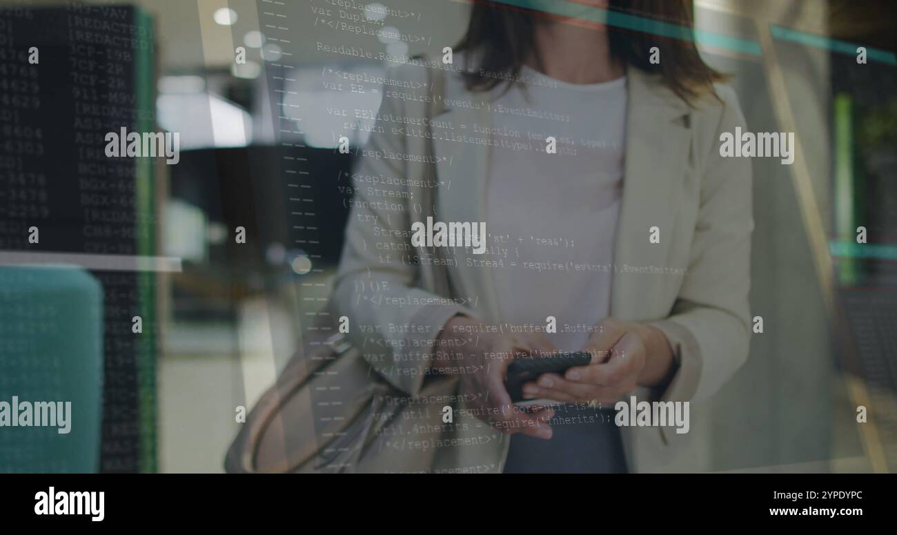 Programming code image over woman using smartphone in modern office Stock Photo