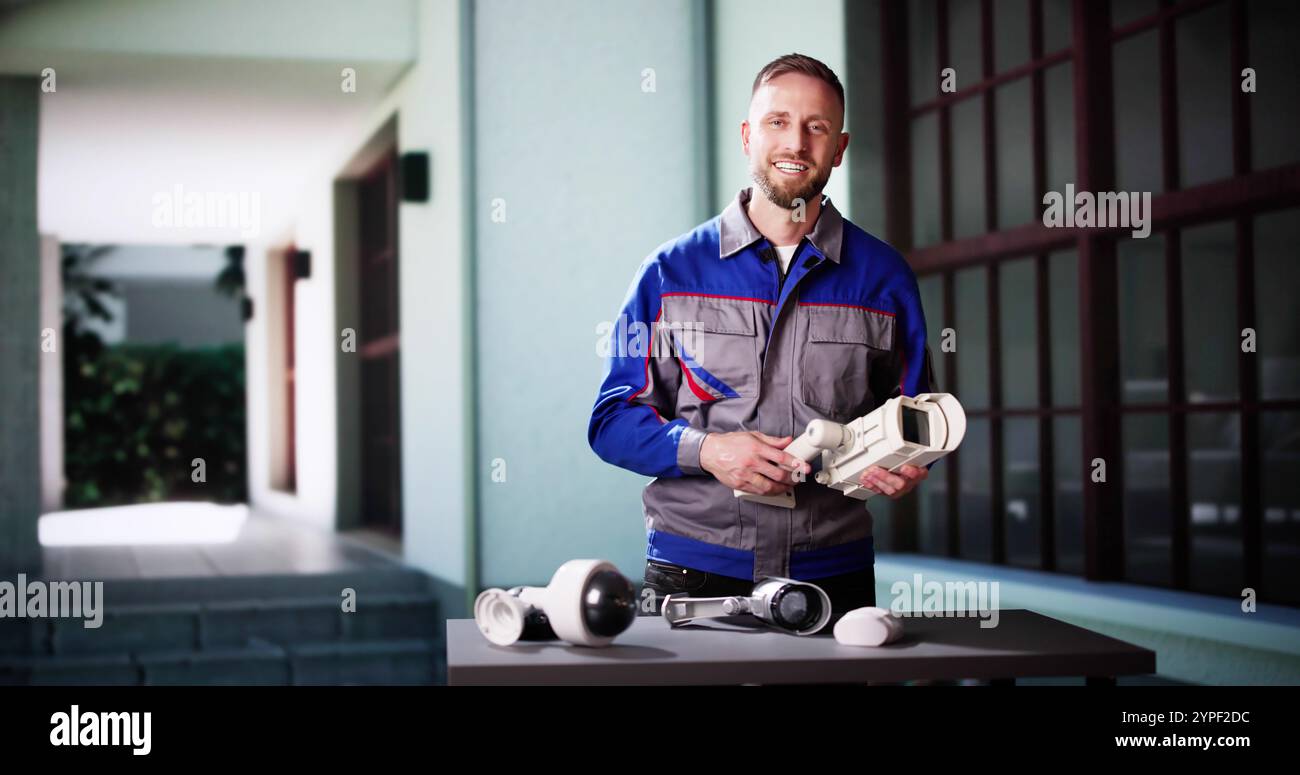 Technician Using Surveillance Security Camera Video System Stock Photo