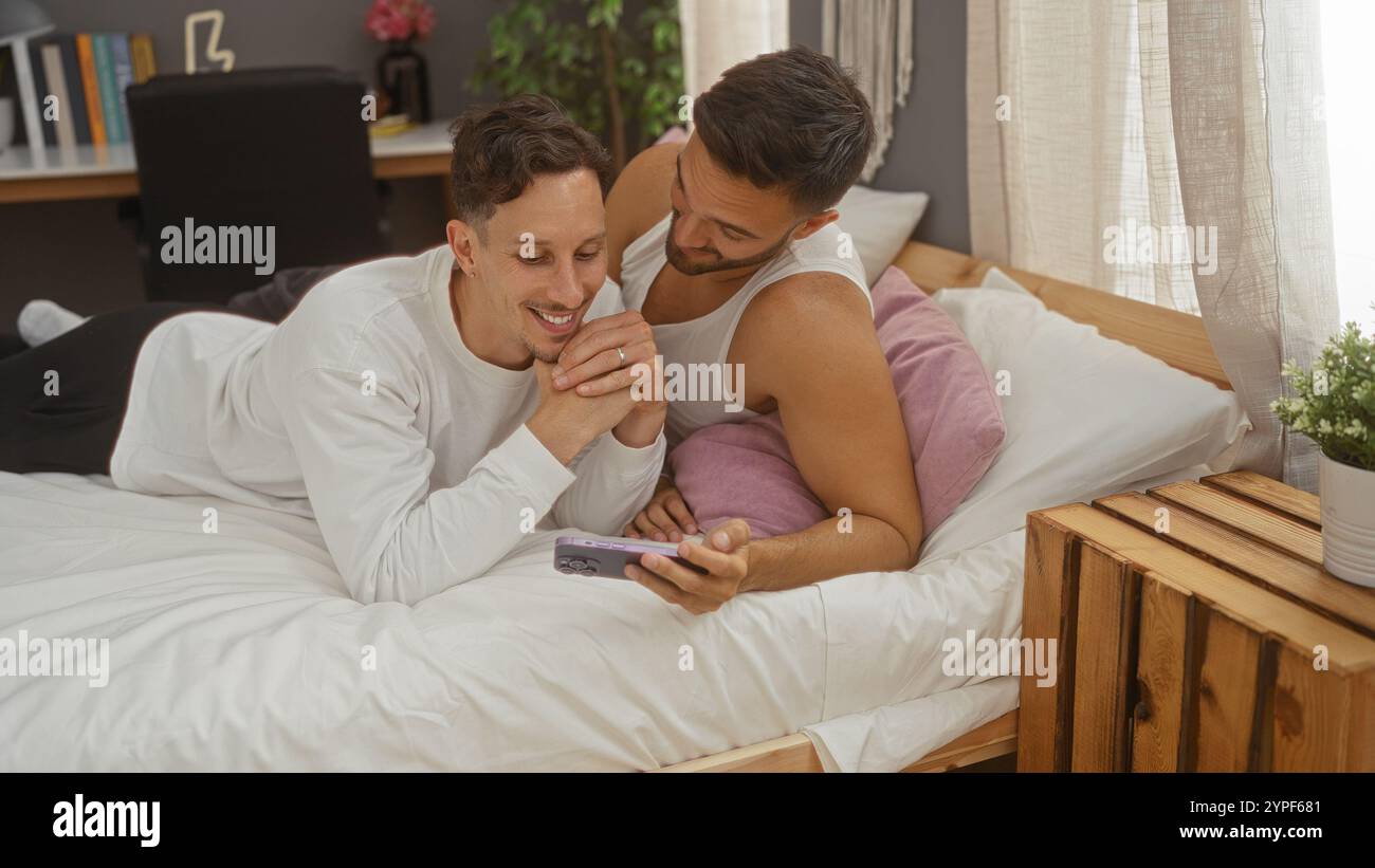Homosexual men in bed together hi-res stock photography and images - Alamy