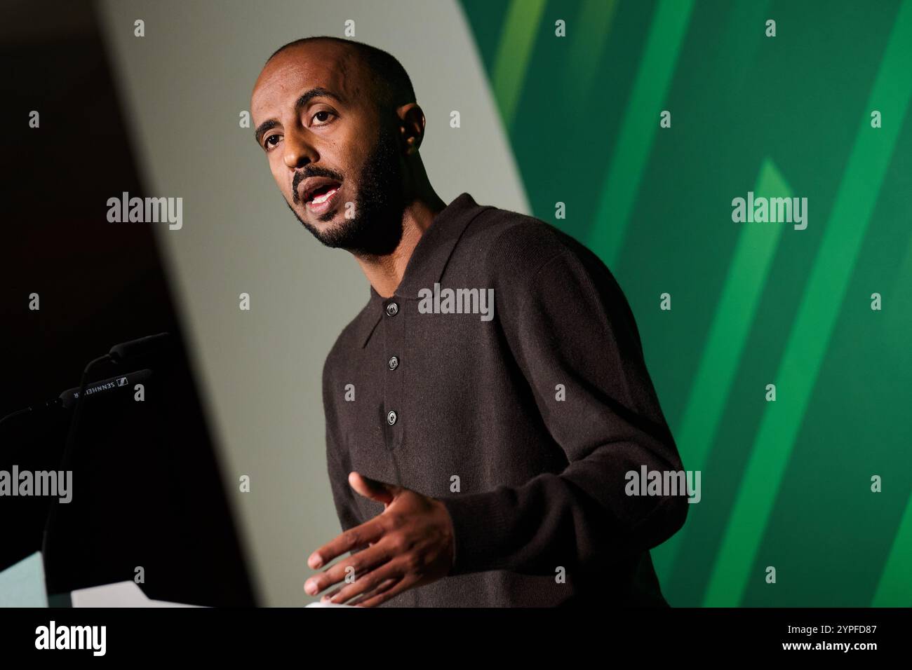 Berlin, Germany. 30th Nov, 2024. Philmon Ghirmai, state chairman of the Berlin Greens, speaks at the state delegates' conference on the main motion with the topic of housing shortage at the Mercure Hotel MOA. The party is preparing for the upcoming federal and state elections. Credit: Annette Riedl/dpa/Alamy Live News Stock Photo