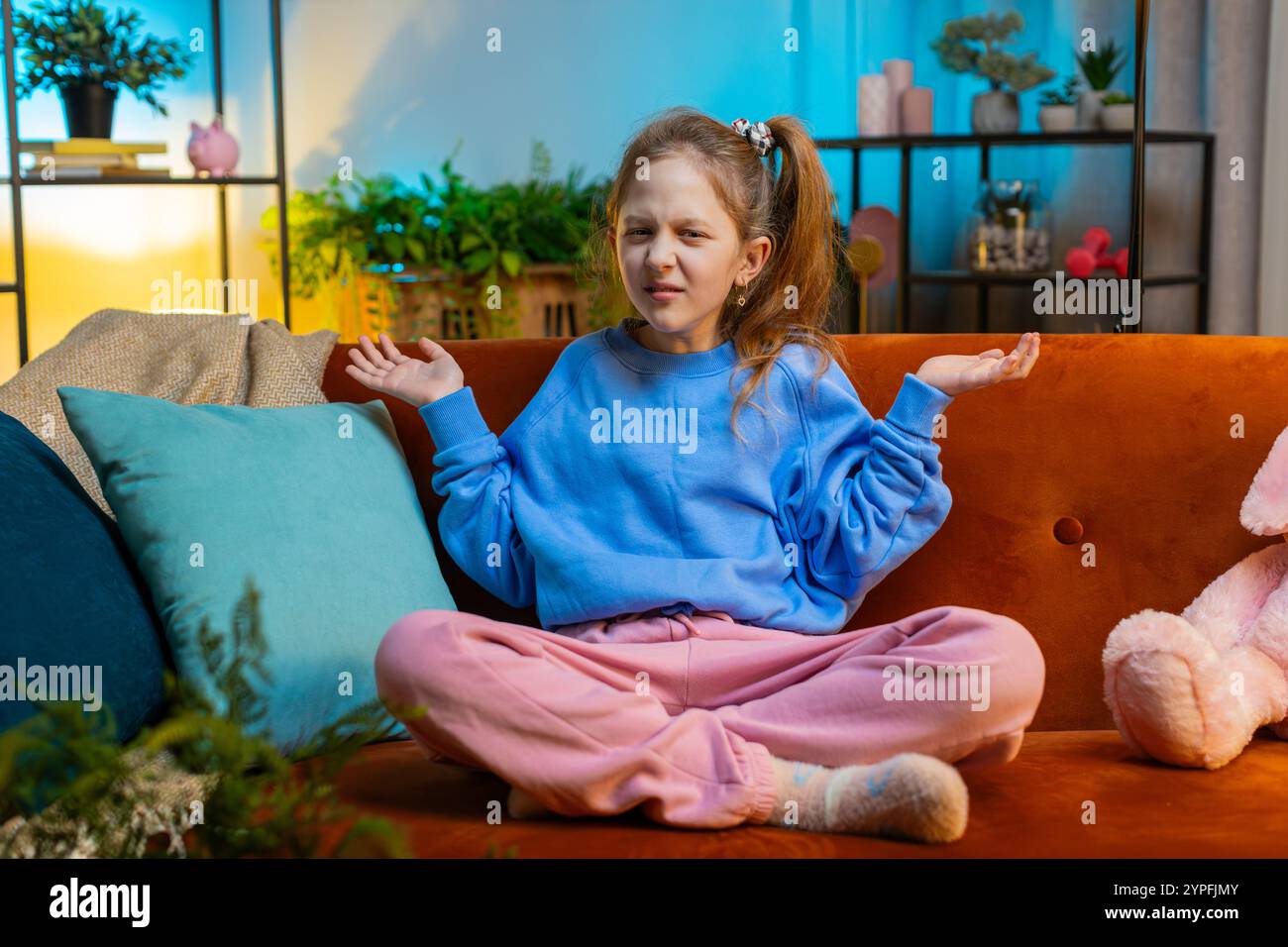 Indignant Children What. Why. Young child girl raising hands in indignant expression ...