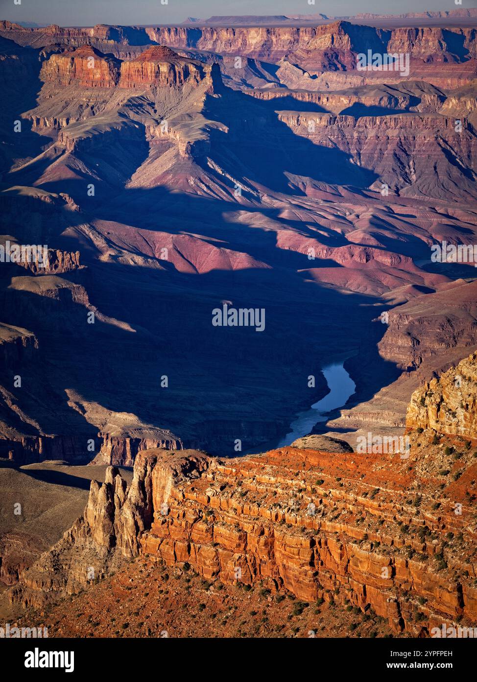 The Colorado River carves its way through the depths of Grand Canyon ...