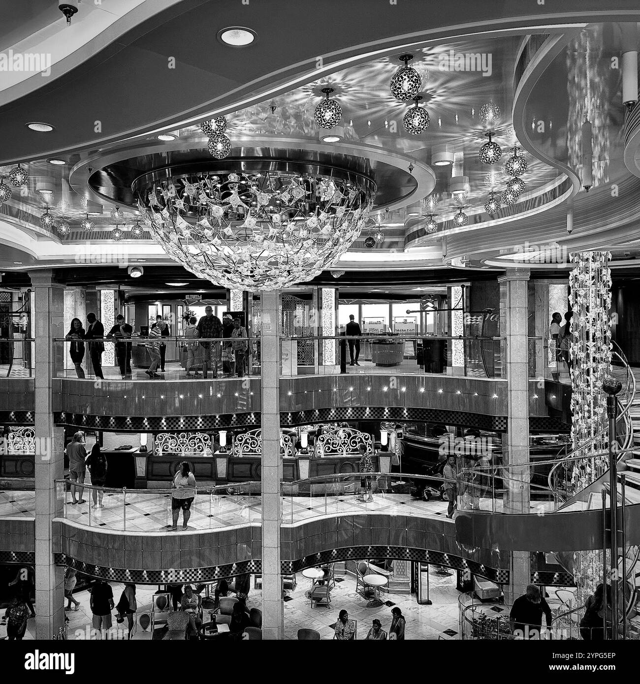 Black and white image of the Piazza atrium on the Regal Princess cruise ship - Smartphone Captured Stock Image