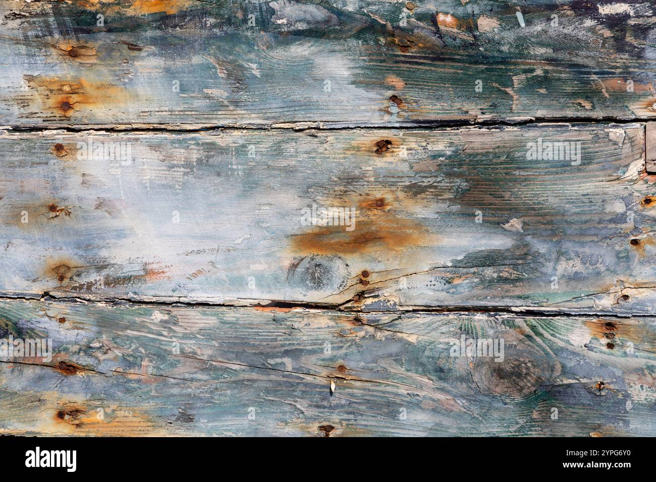 pattern of old rotten wooden planks at an old ship in harmonic aging ...