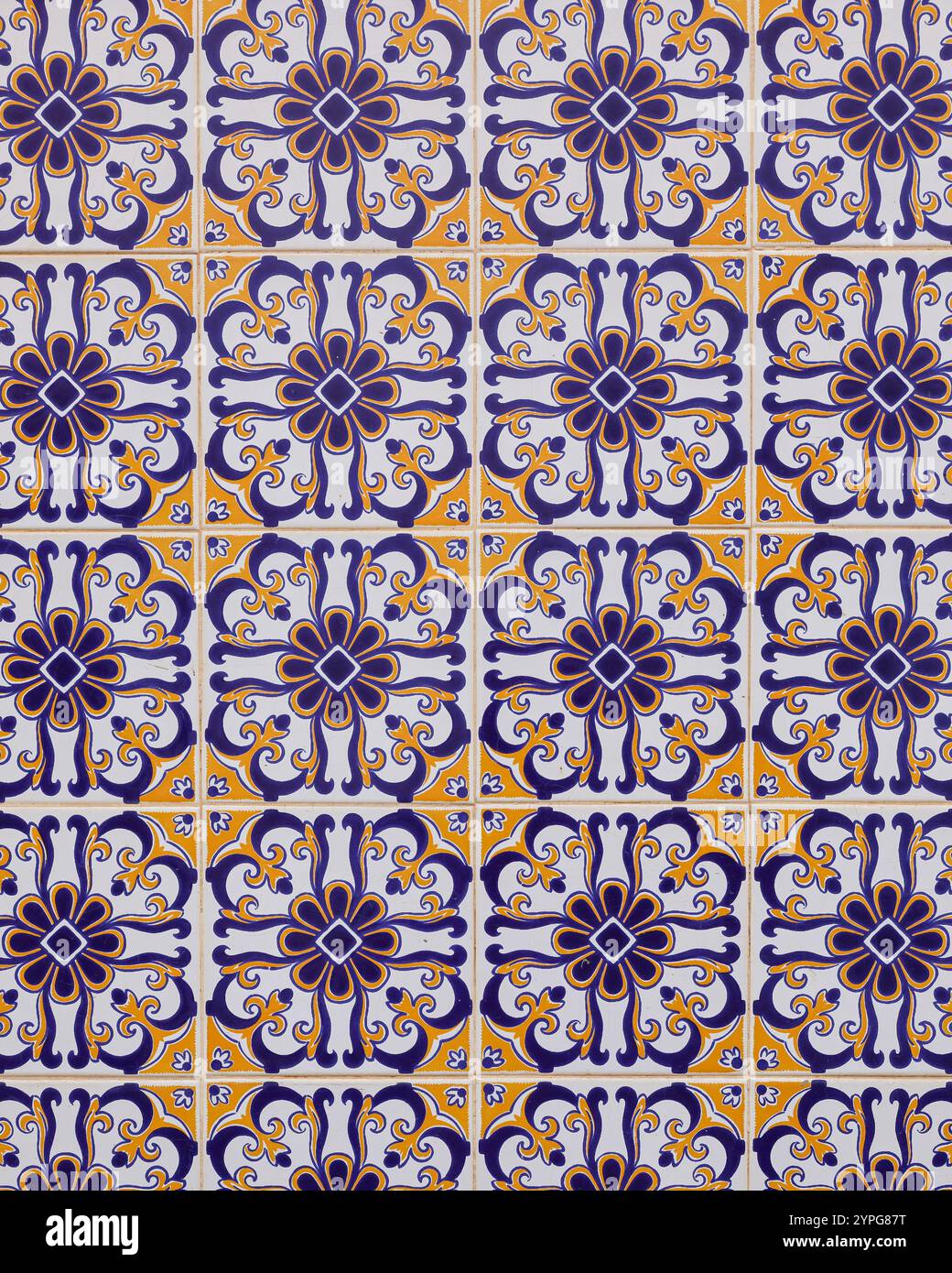 Traditional Portuguese glazed Azulejos wall tiles in colourful pattern, Algarve, Portugal Stock Photo