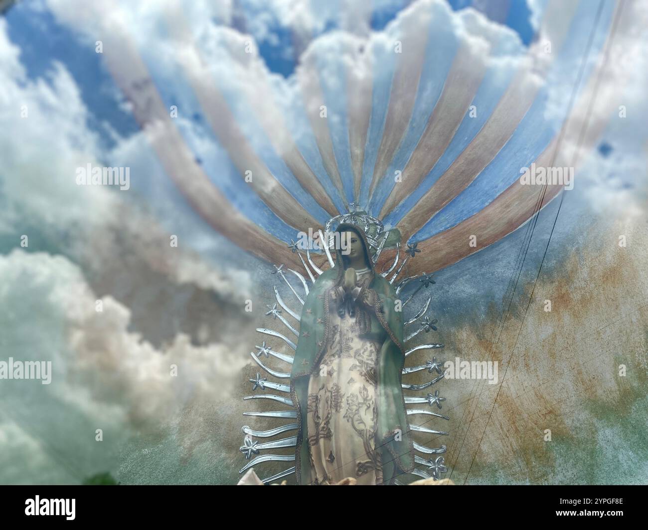 The reflection of the sky with white clouds in an altar to Our Lady of Guadalupe in San Miguel de las Tetillas, Ezequiel Montes, Queretaro, Mexico - Smartphone Captured Stock Image
