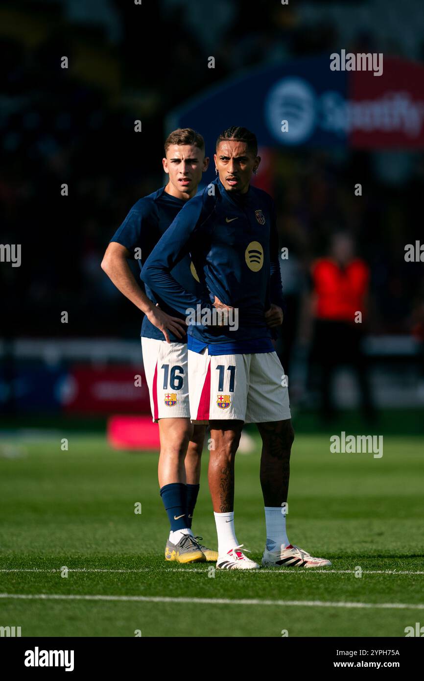 Barcelona, Spain, 30, November, 2024.  Spanish LaLiga EA Sports: FC Barcelona v UD Las Palmas.  (16) Fermin Lopez and (11) Raphinha warming up.  Credit: Joan G/Alamy Live News Stock Photo