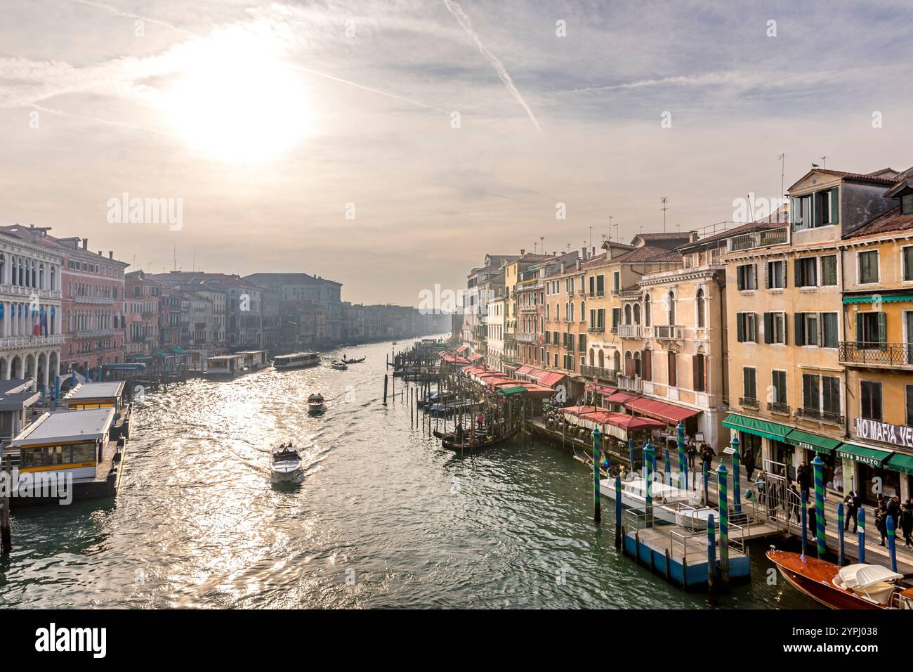 Venice, Italy - February 4, 2024: Architecture of Venice, palaces and beautiful houses along the Grand Canal near Rialto bridge, Italy Stock Photo