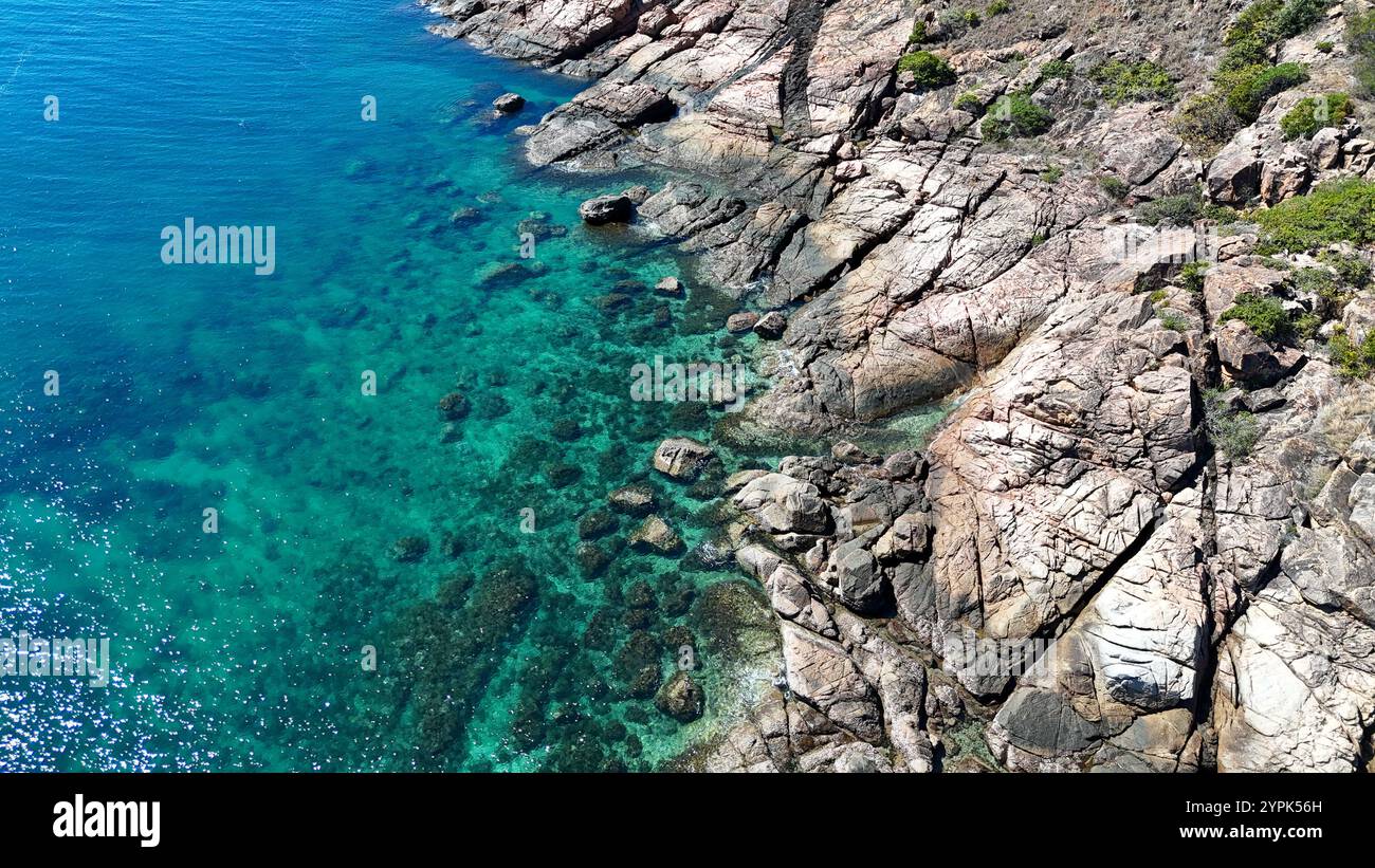Aerial view of small tropical island with reef surrounding Stock Photo ...