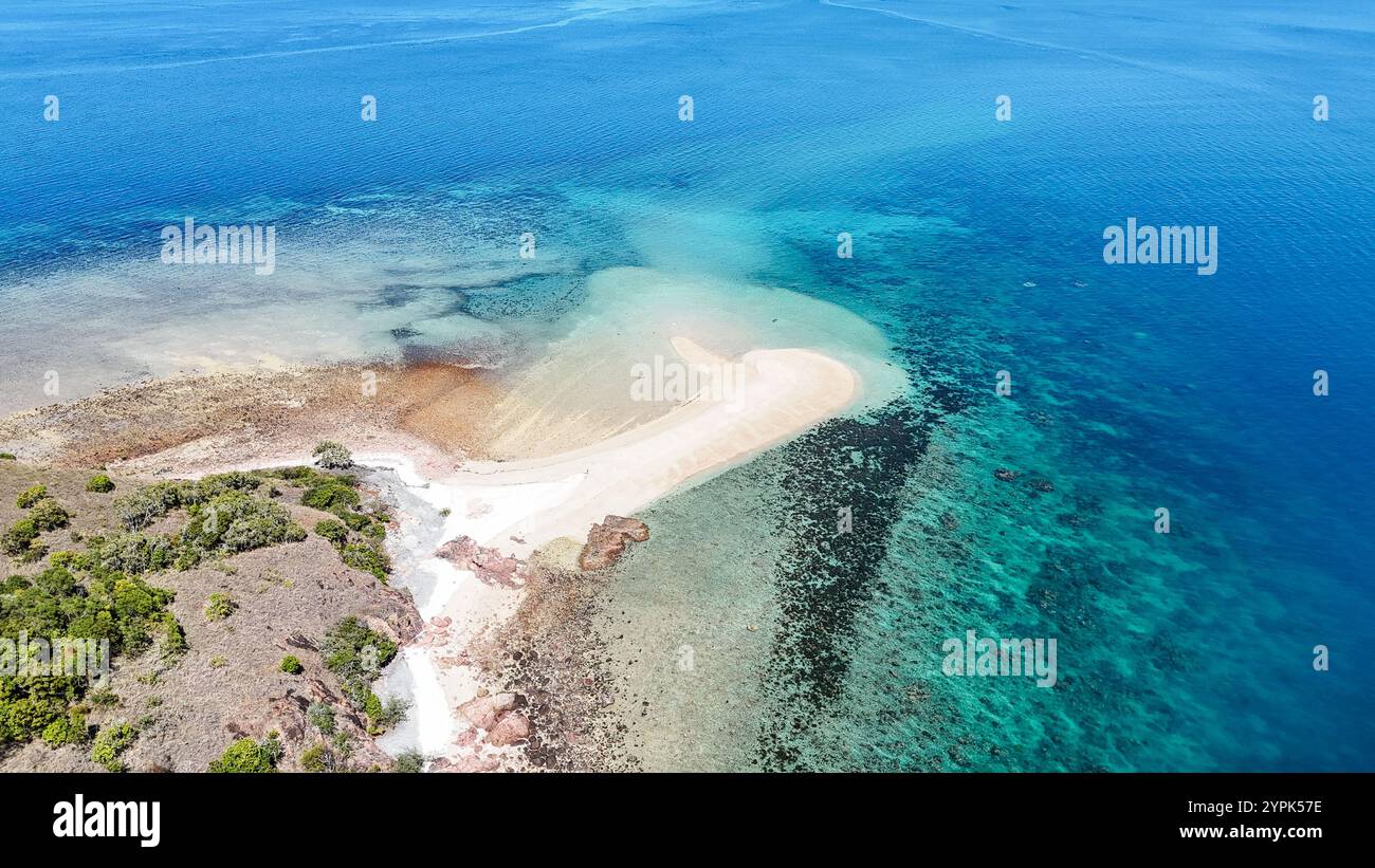 Aerial view of small tropical island with reef surrounding Stock Photo ...