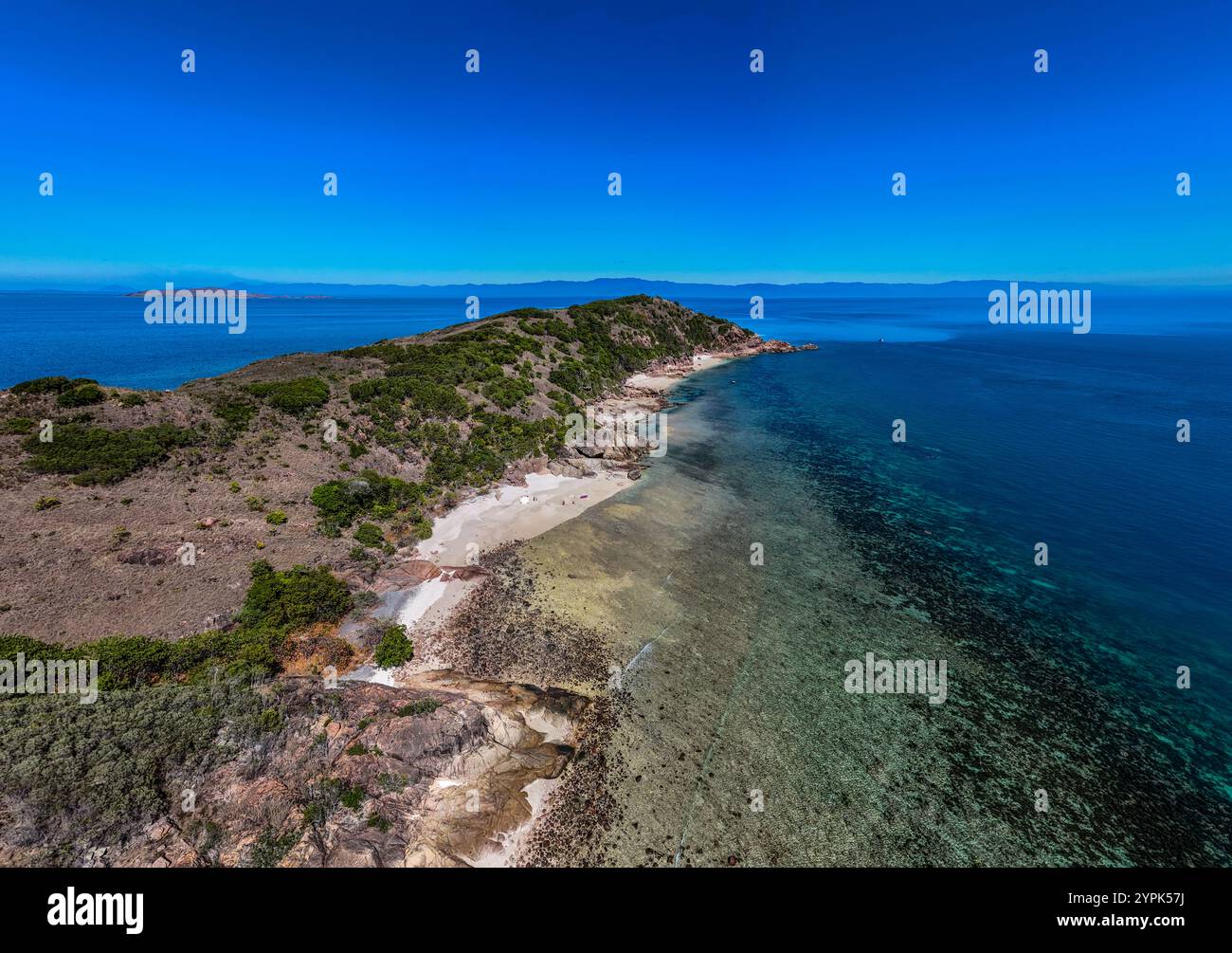 Aerial view of small tropical island with reef surrounding Stock Photo ...