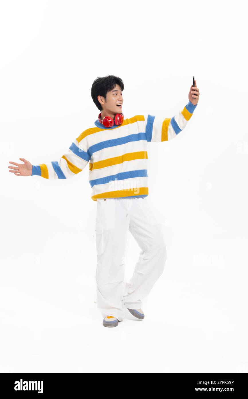 Adult male wearing white headphones hi-res stock photography and images ...