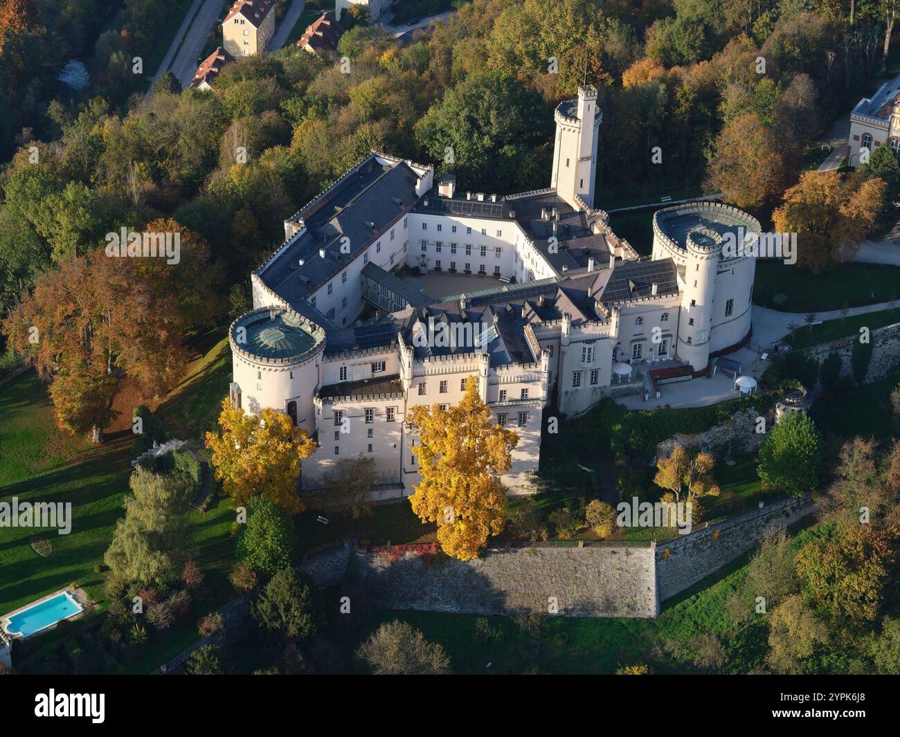 AERIAL VIEW. Wolfsberg Castle in the fall. Wolfsberg, Carinthia, Austria. Stock Photo