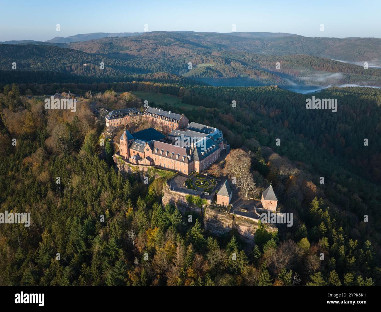 AERIAL VIEW. Mont-Sainte-Odile Abbey (aka Hohenbourg Abbey) on a mountaintop in the Eastern Vosges Mountains. Ottrott, Bas-Rhin, Alsace, France. Stock Photo