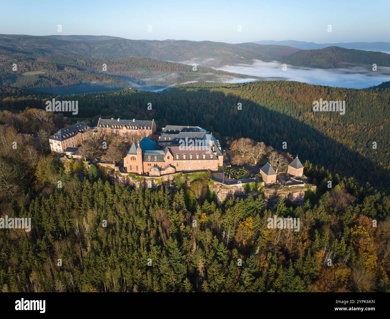 AERIAL VIEW. Mont-Sainte-Odile Abbey (aka Hohenbourg Abbey) on a mountaintop in the Eastern Vosges Mountains. Ottrott, Bas-Rhin, Alsace, France. Stock Photo