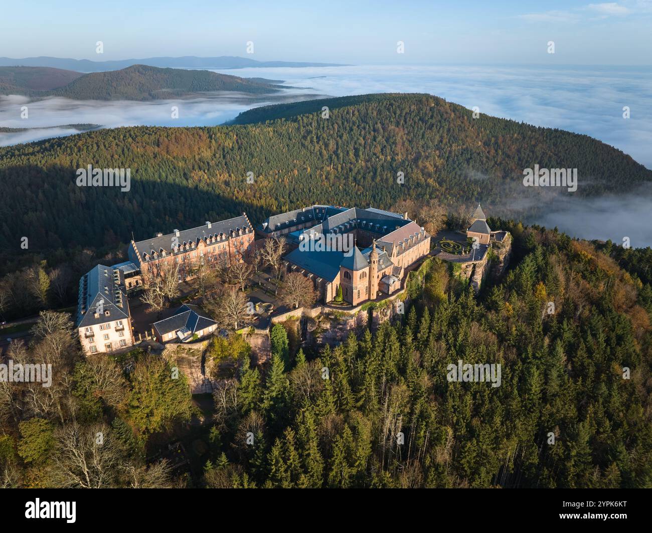 AERIAL VIEW. Mont-Sainte-Odile Abbey (aka Hohenbourg Abbey) on a mountaintop in the Eastern Vosges Mountains. Ottrott, Bas-Rhin, Alsace, France. Stock Photo
