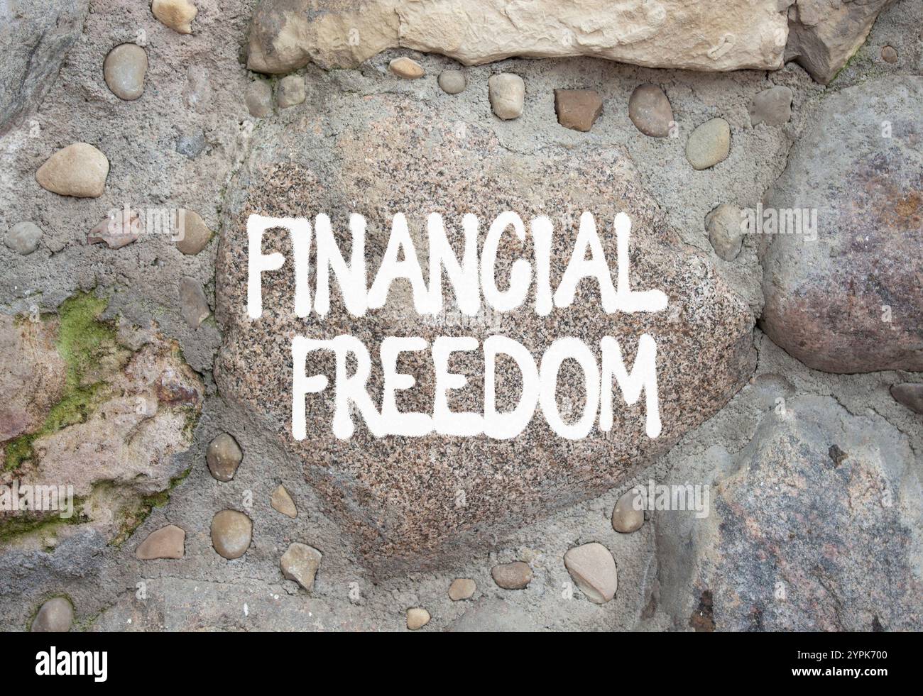 Financial freedom symbol. Stone wall with words Financial freedom ...