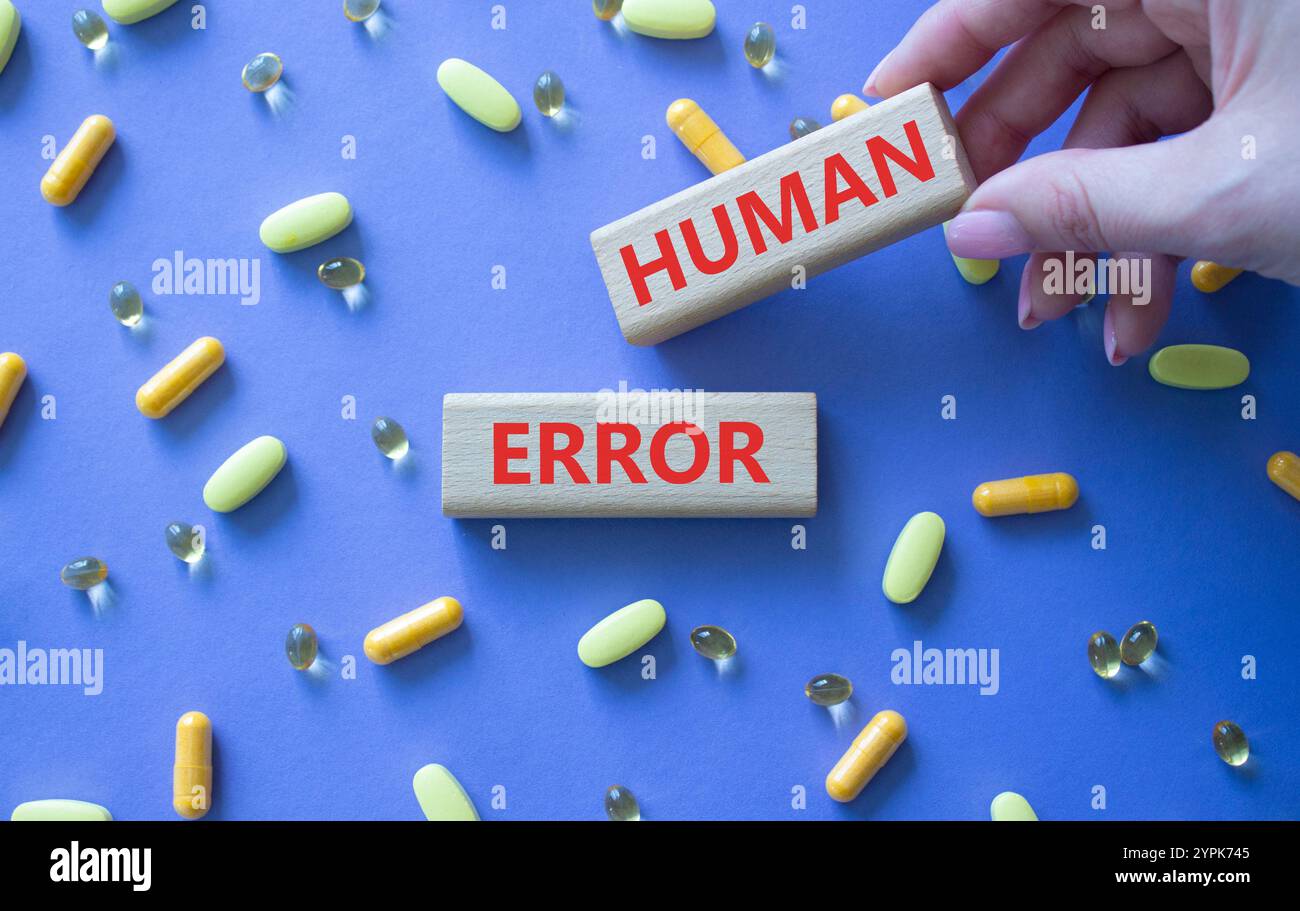 Human Error symbol. Concept word Human Error on wooden blocks ...