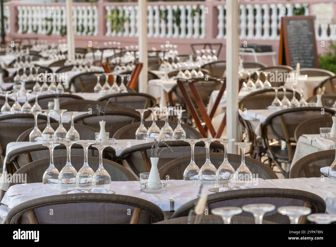Empty wine glass on a restaurant table close-up Stock Photo