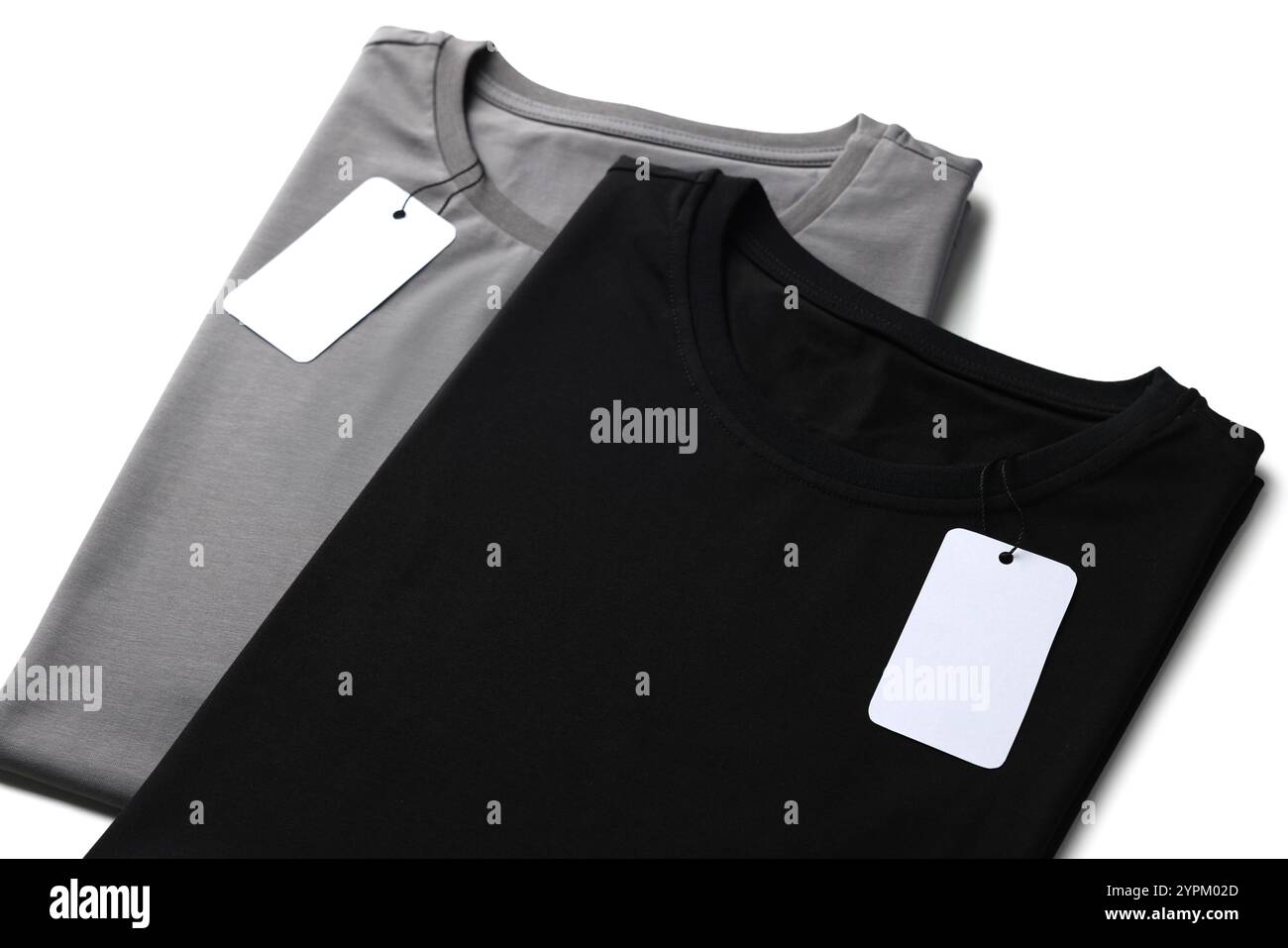 Black and grey tshirts with tags on white background. Mockup for