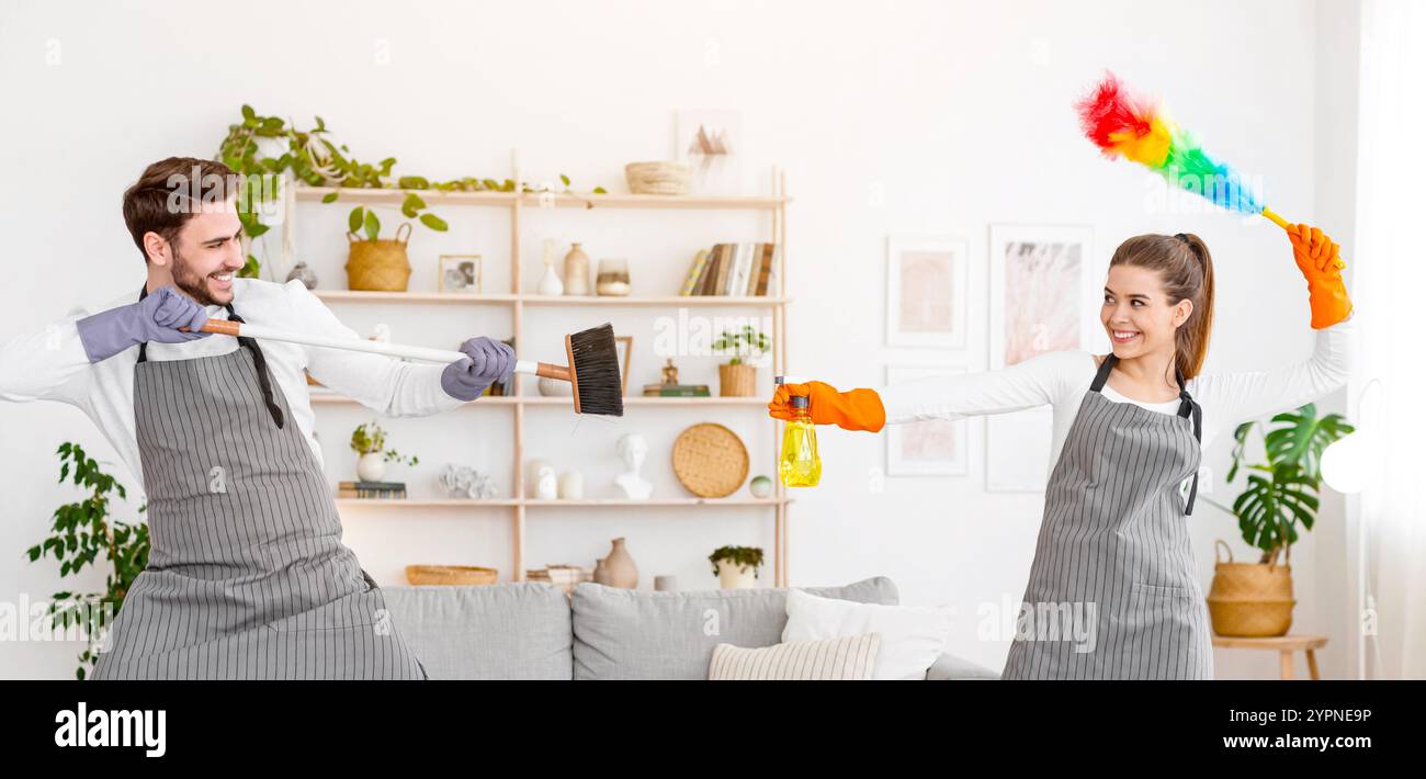 Married couple during housework hi-res stock photography and images - Alamy