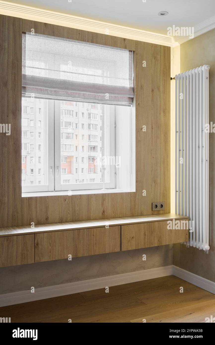 Modern minimalist design includes natural wooden accents that enhance ...