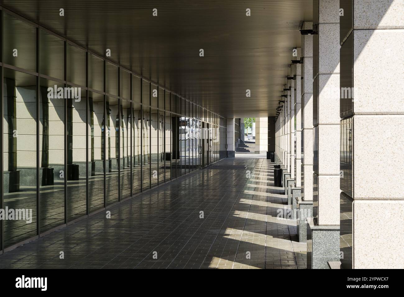 Long passage with columns. Office building at Ovchinnikovskaya Embankment, Zamoskvorechye, Moscow, Russia, Europe Stock Photo