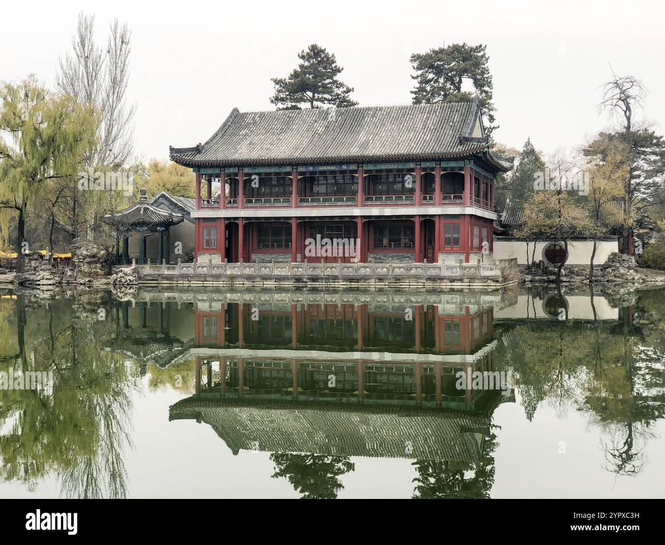 Little pavilions next the lake inside the Imperial Summer Palace of The Mountain Resort in Chengde. China. Chinese ancient building with lake. UNESCO Stock Photo