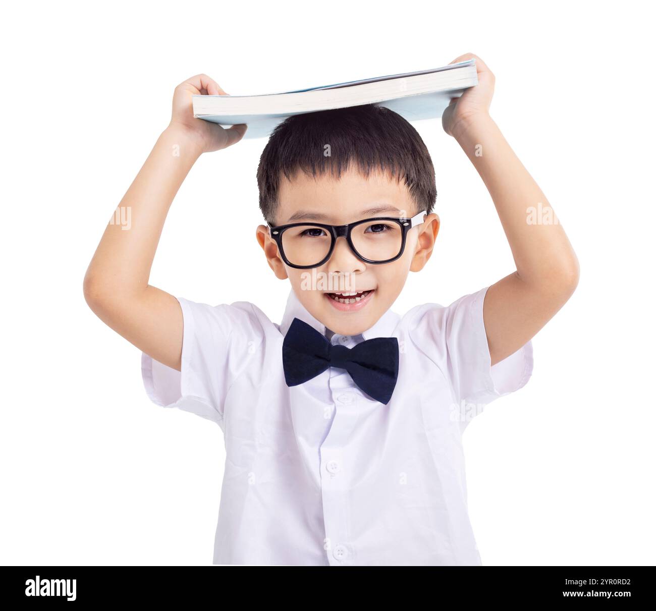 Little schoolboy with book isolated on white background Stock Photo - Alamy