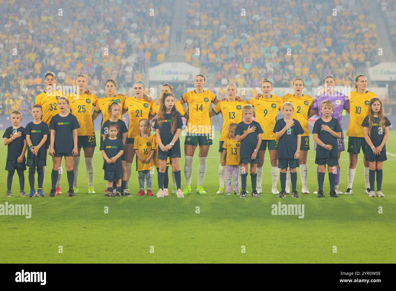 Gold Coast, Australia. 01st Dec, 2024. Robina, Australia, December 1st 2024: Players of the Matildas line up with team mascots before the friendly international match between Australias CommBank Matildas and Brazil Women at the Cbus Super Stadium, Robina, Australia Matthew Starling (Promediapix/SPP) Credit: SPP Sport Press Photo. /Alamy Live News Stock Photo