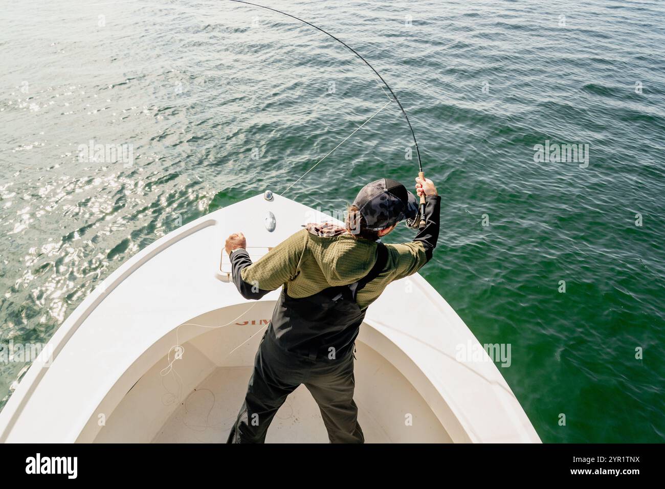 Casting for Stiped Bass Long Island Sound Stock Photo