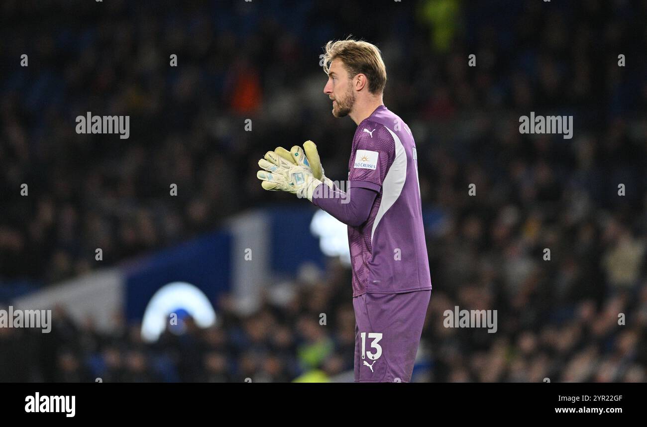 Joe Lumley of Southampton during the Premier League match between Brighton and Hove Albion and Southampton at the American Express Stadium  , Brighton , UK - 29th November 2024 - Photo Simon Dack / Telephoto Images Editorial use only. No merchandising. For Football images FA and Premier League restrictions apply inc. no internet/mobile usage without FAPL license - for details contact Football Dataco Stock Photo