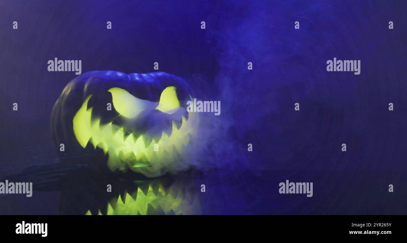 Glowing jack lantern with smoke image over dark background Stock Photo ...