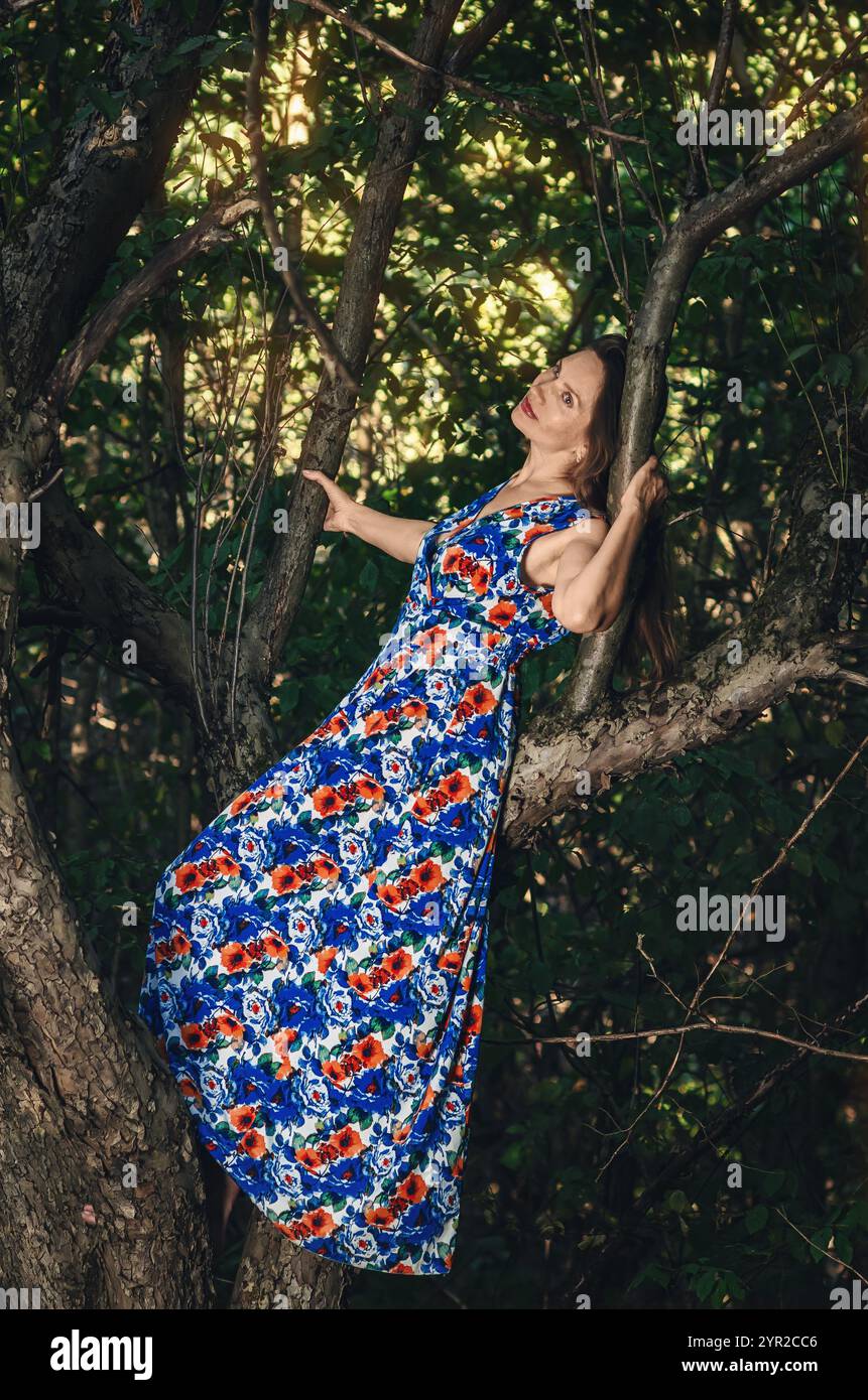 Arms stretched around tree hi-res stock photography and images - Alamy