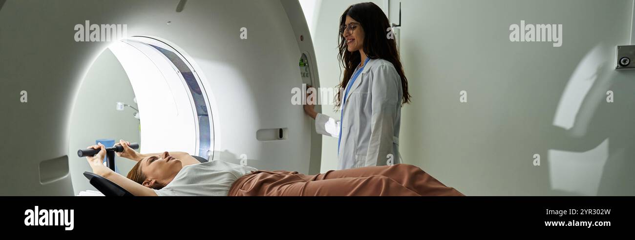 Female doctor guides patient while preparing for MRI scan in healthcare ...