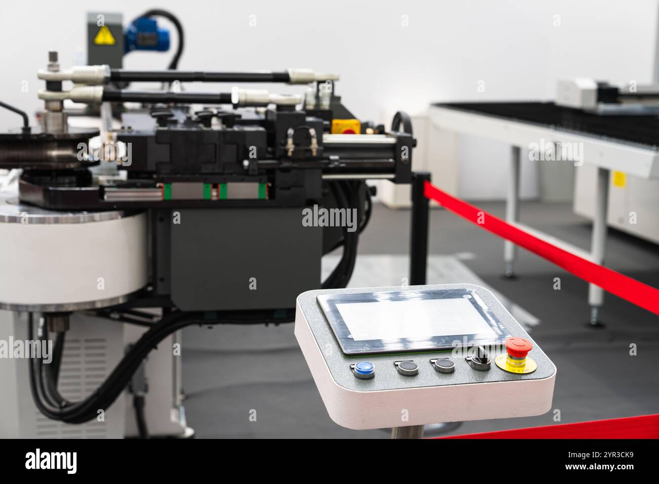 CNC mashine. Motorized maneuverable tool is controlled by a computer. Smart factory. Stock Photo
