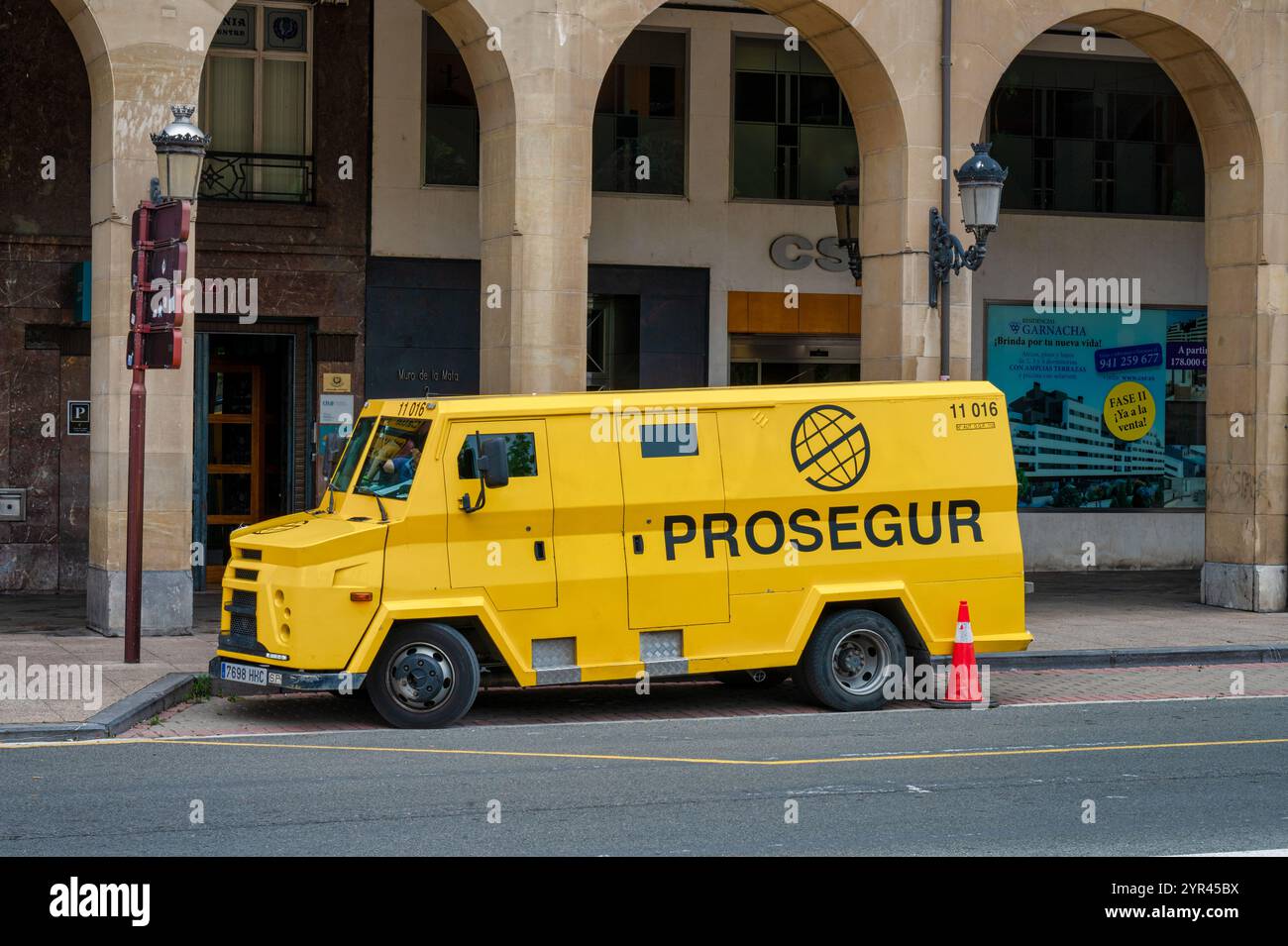 Logrono, Spain- May 27, 2024: Yellow Prosegur Armoured van parked on a street  in Logrono northern Spain Stock Photo