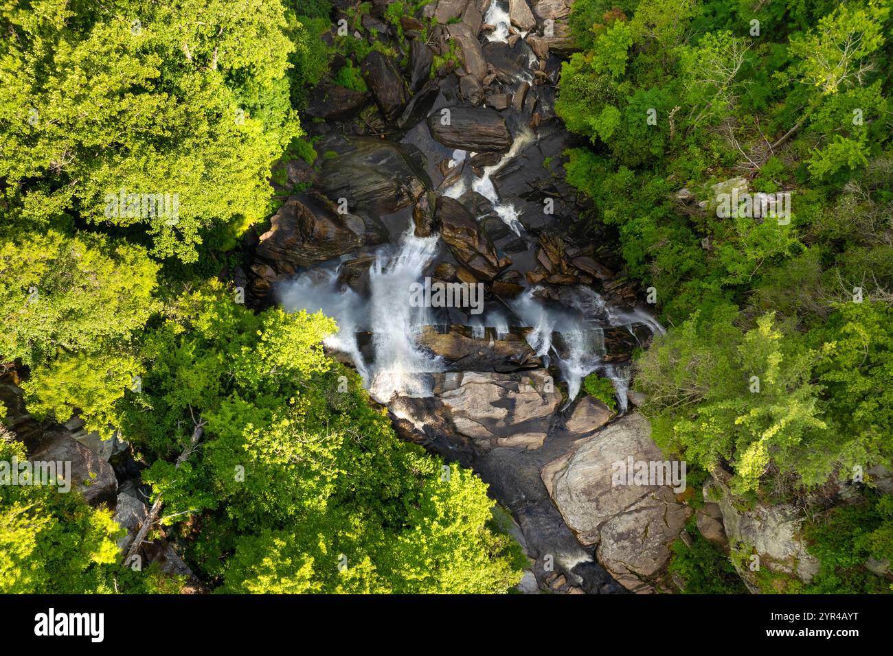 Beautiful landscape of high waterfall with falling down clear water ...
