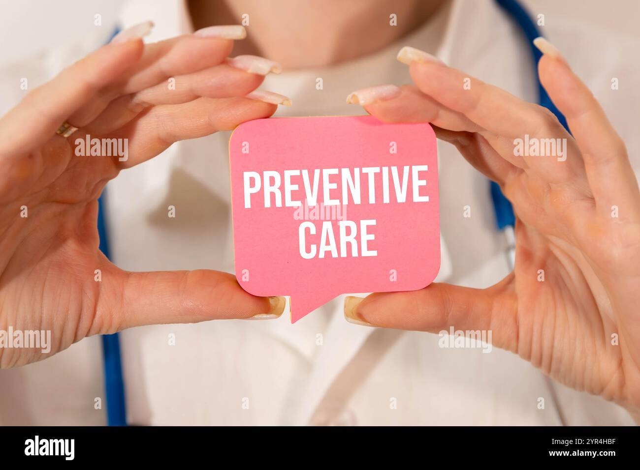 A coloured wooden block with text PREVENTIVE CARE Stock Photo - Alamy