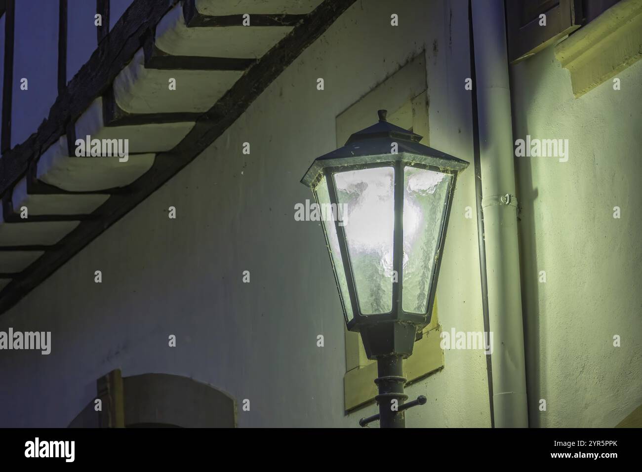 Moody lamp lit street hi-res stock photography and images - Alamy