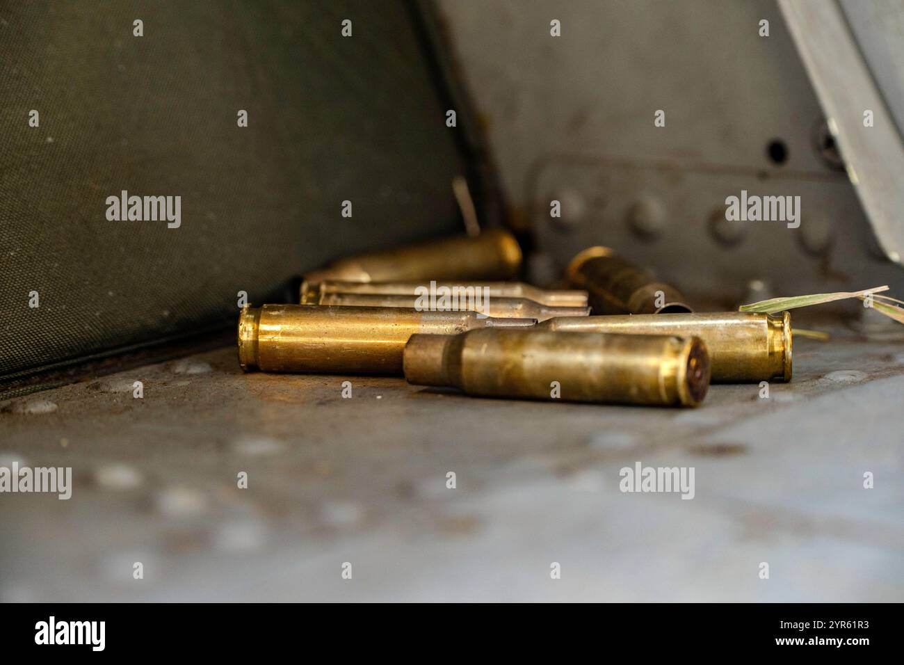 7.62 round casings lay on the floor of a UH-60 Blackhawk helicopter assigned to 3rd Battalion, 25th Aviation Regiment, 25th Combat Aviation Brigade, 25th Infantry Division after being fired during a live fire training exercise on Schofield Barracks on Oahu, Hawaii, Nov. 25, 2024. 3-25 AVN Soldiers provided cover fire and transport for 2nd Battalion, 27th Infantry Regiment, 3rd Infantry Brigade Combat Team, 25th ID Soldiers during a live fire training exercise. (U.S. Army photo by Spc. Charles Clark) Stock Photo