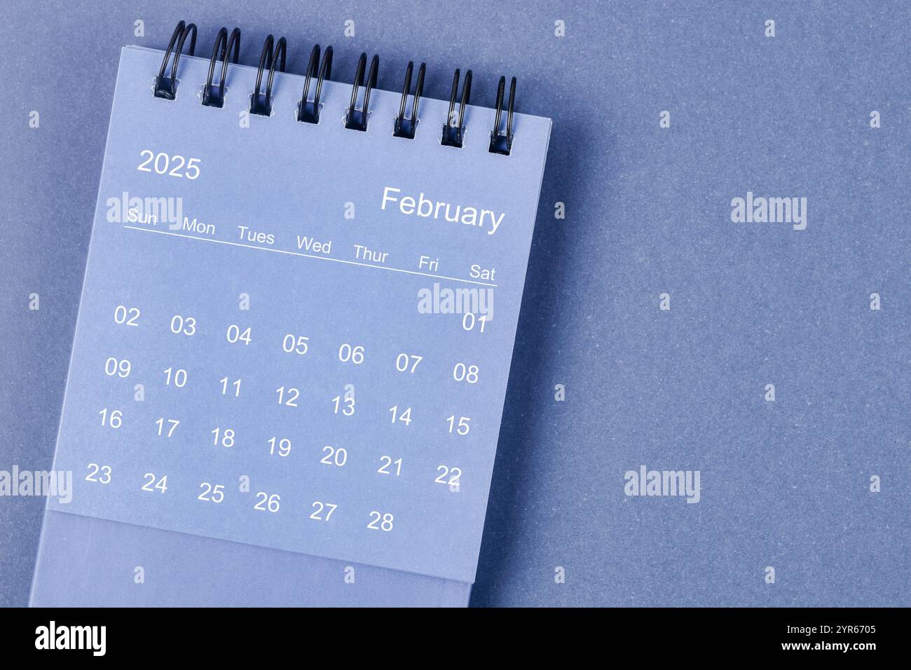 February 2025 Monthly desk calendar for 2025 year on blue color