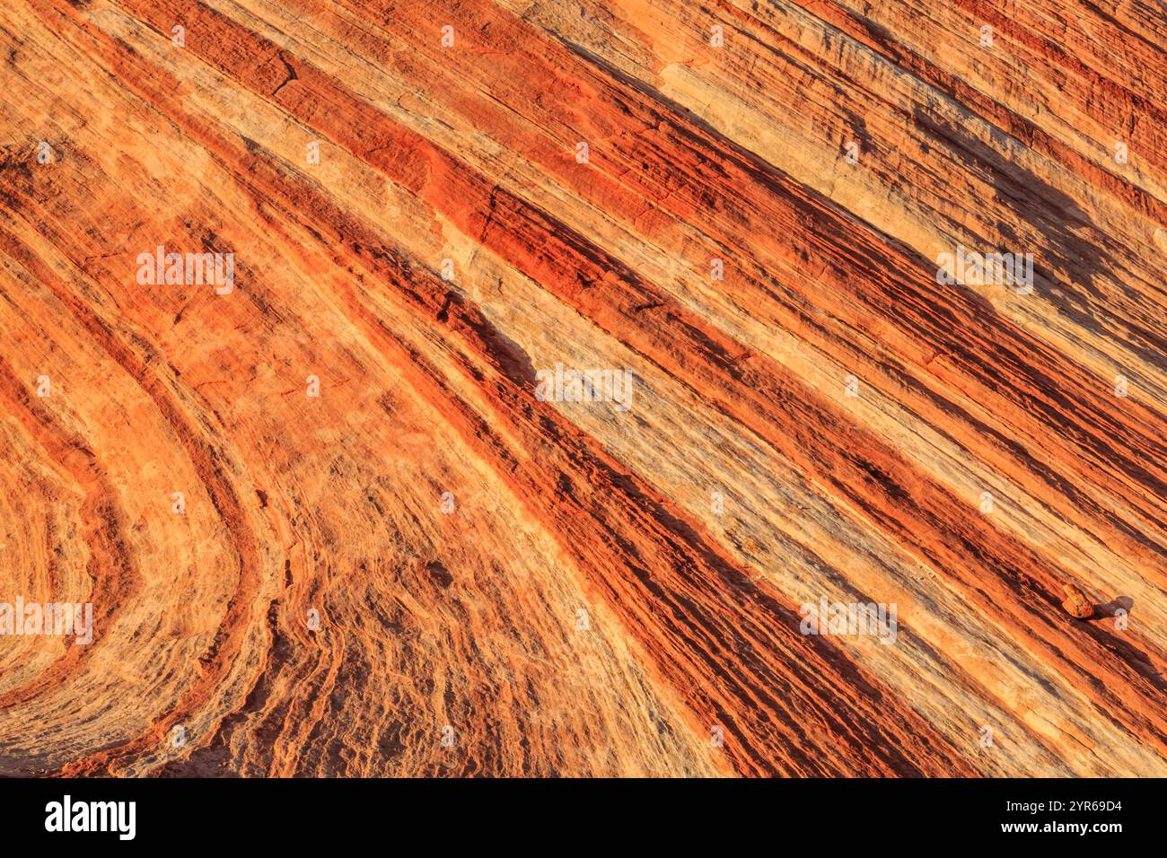 The image is of a rocky, red and brown landscape with a lot of texture ...
