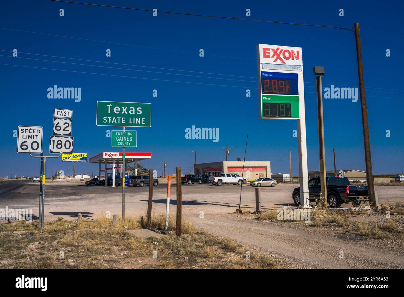 APRIL 2021, TEXAS, USA Texas State Line and Exxon Gas Station - the Petroleum State - Oil Country Stock Photo