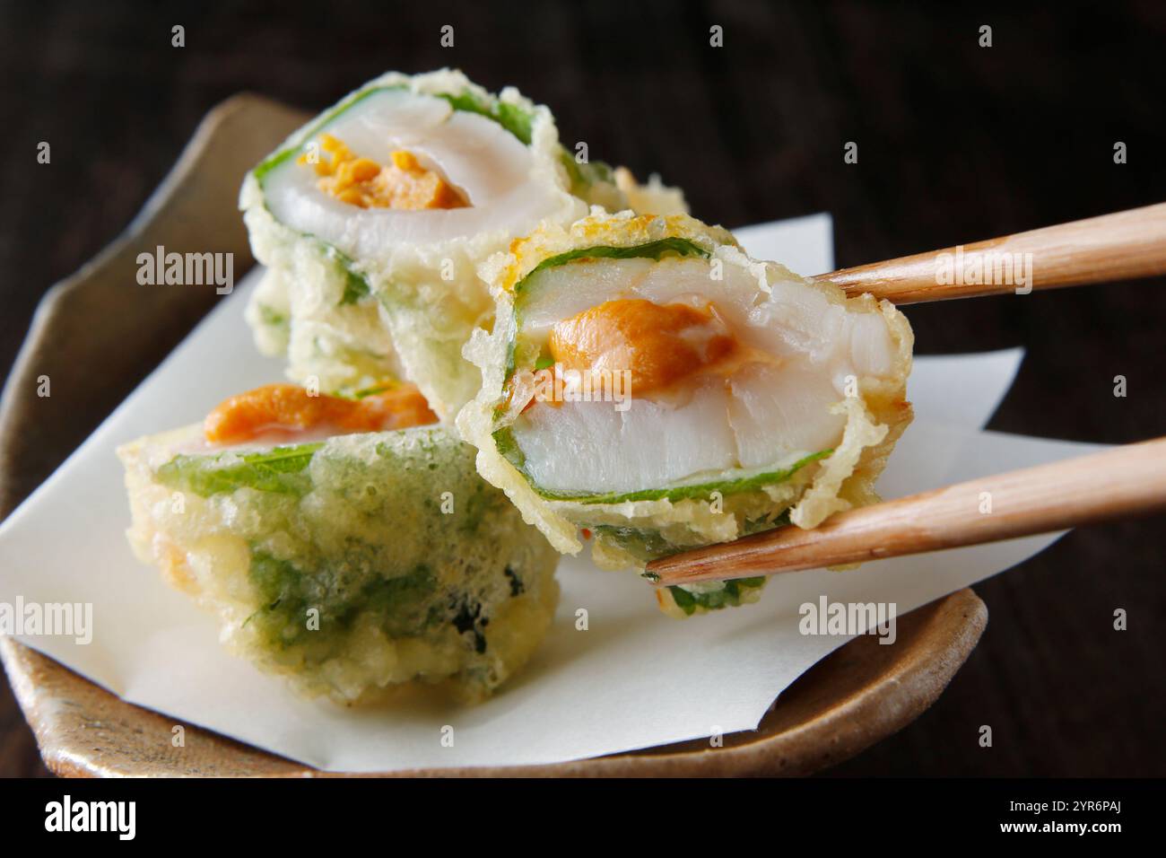 Deep-fried scallop with sea urchin Stock Photo