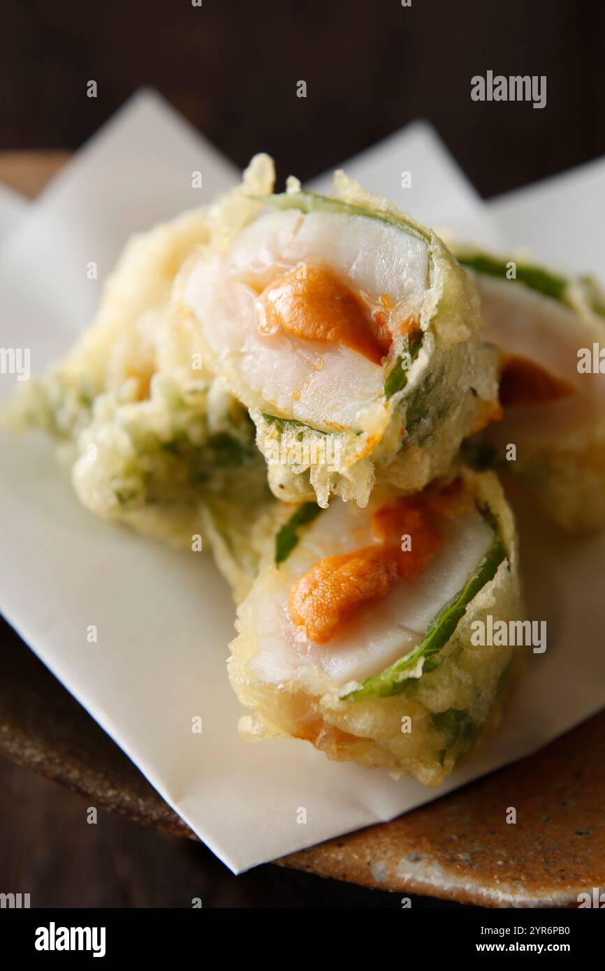 Deep-fried scallop with sea urchin Stock Photo