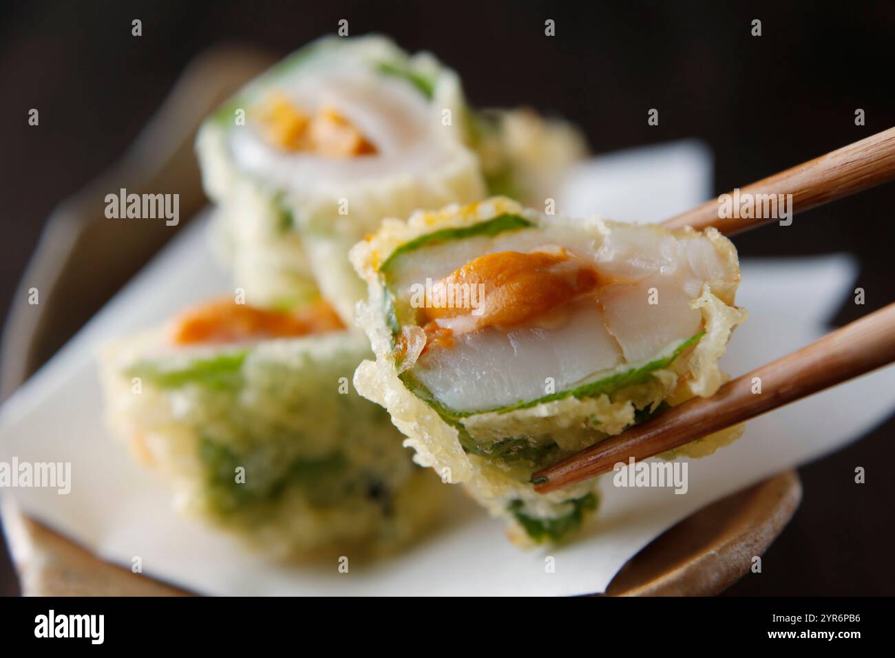 Deep-fried scallop with sea urchin Stock Photo